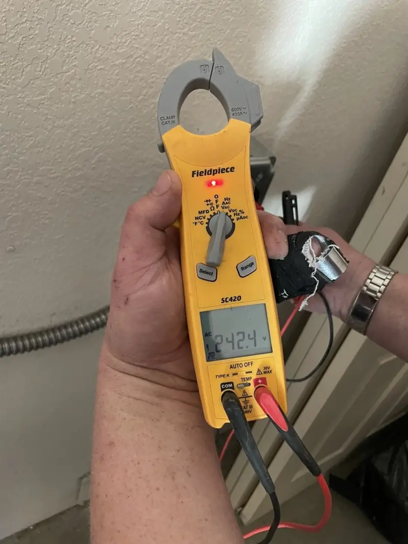 Voltage testing with clamp meter during Circuit Breaker Repair in Paloma Creek